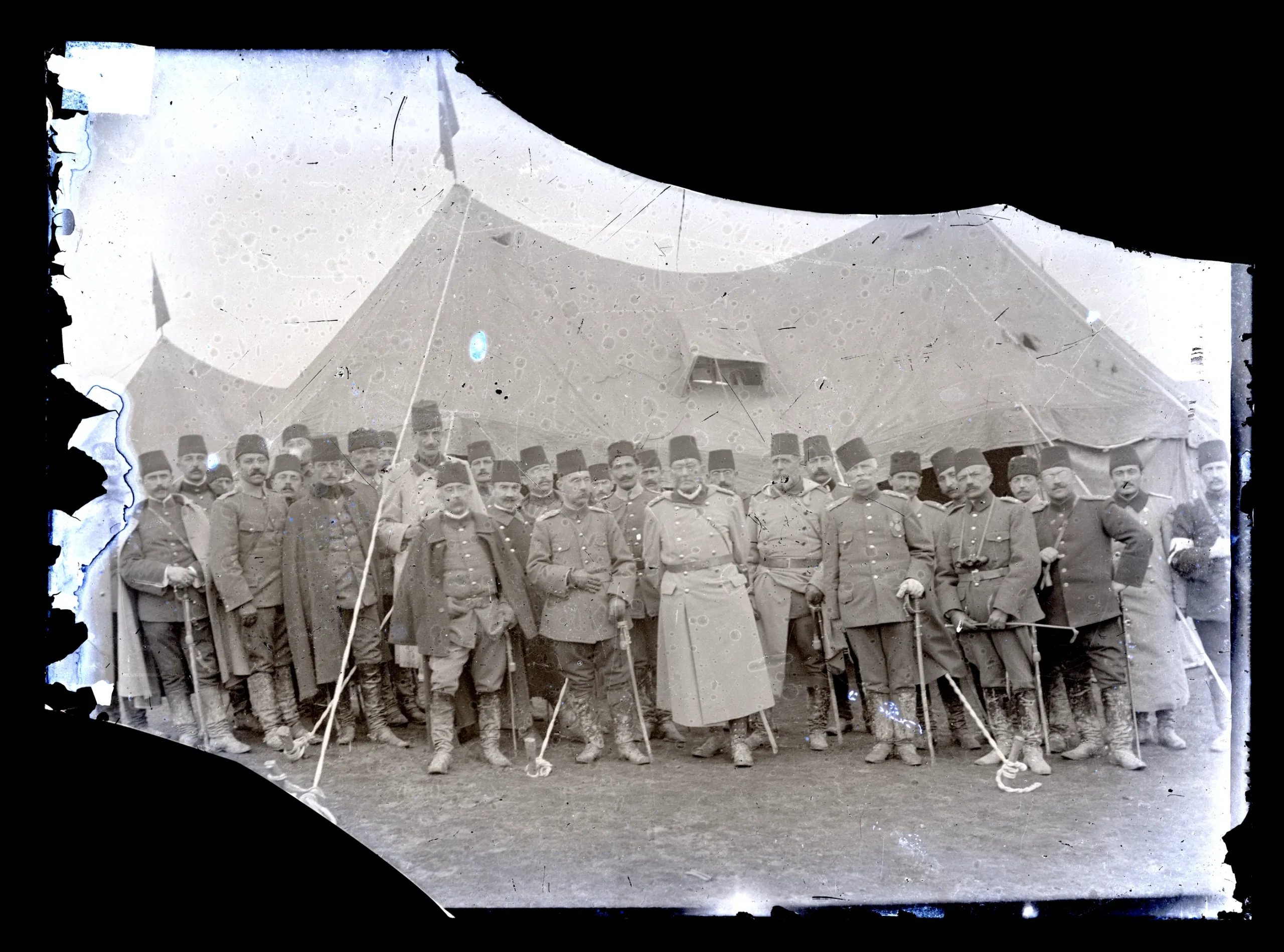 Officers in front of the tents, at manoeuvres